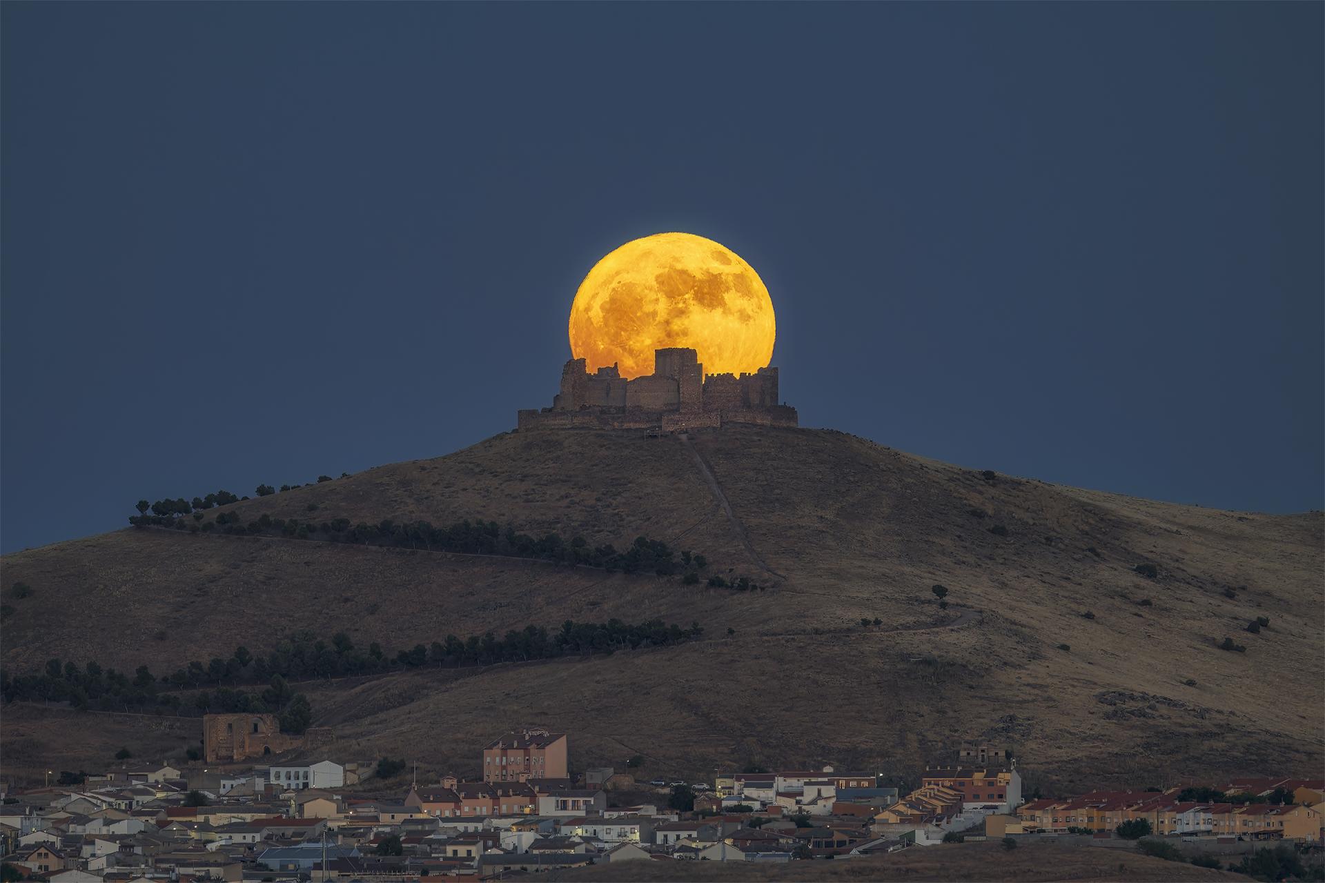 European Photography Awards Winner - The moon emerging from the castle.